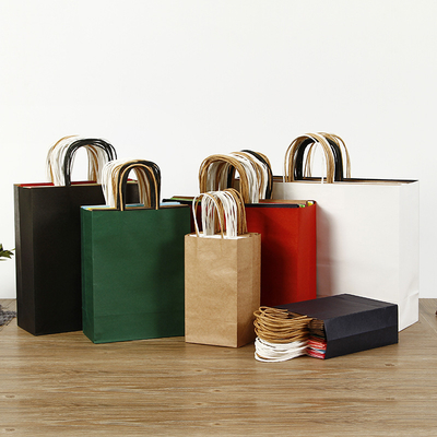 Hot Selling Recyclable Kraft Paper Bag With Reusable Twisted Handle Boutique Paper Shopping Bag Logo Printed